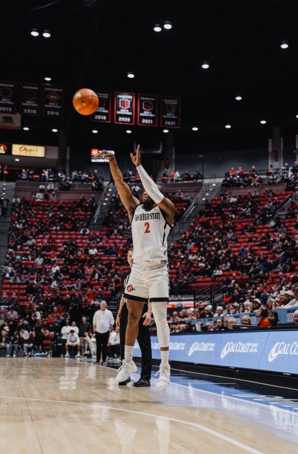 Senior Adam Seiko shoots what would be one of his six made threes against Occidental College on Friday Dec. 2, 2022.