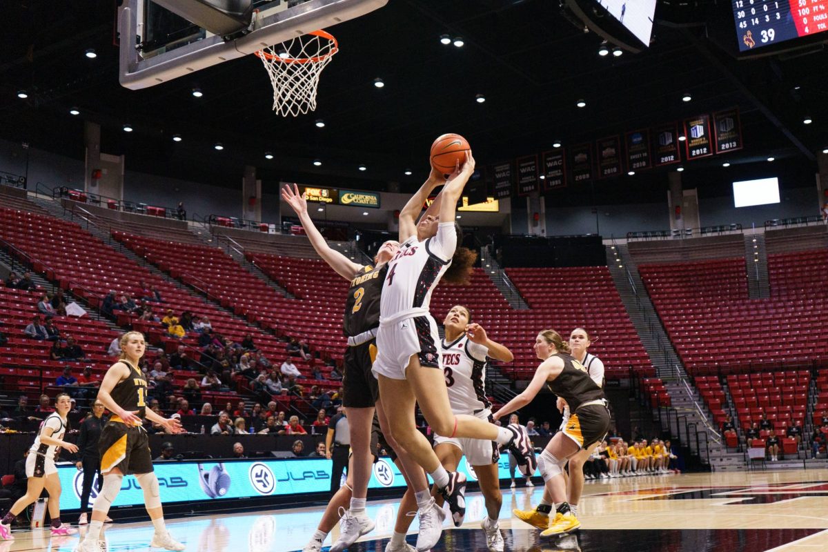 San Diego State guard, Veronica Sheffey, secures the offensive rebound against Wyoming at Viejas Arena on Feb. 8, 2025.