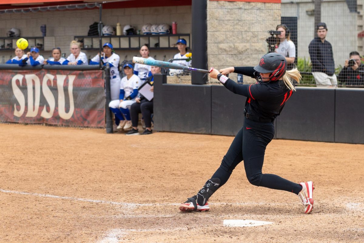 San Diego State catcher Cali Decker (11) hits the game-winning RBI against San Jose State on Saturday, May 3, 2025, at SDSU Softball Stadium, Calif.
